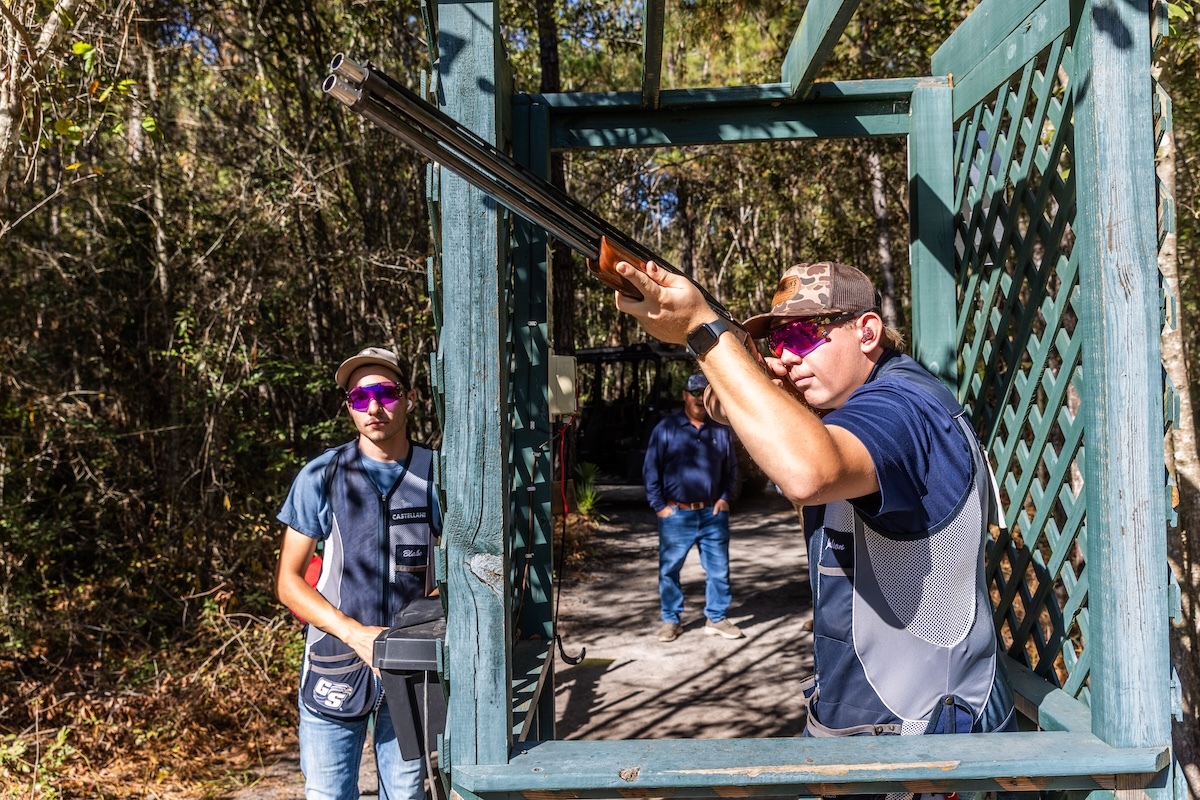 Participants of the sporting clay shoot take aim Participants of the sporting clay shoot take aim