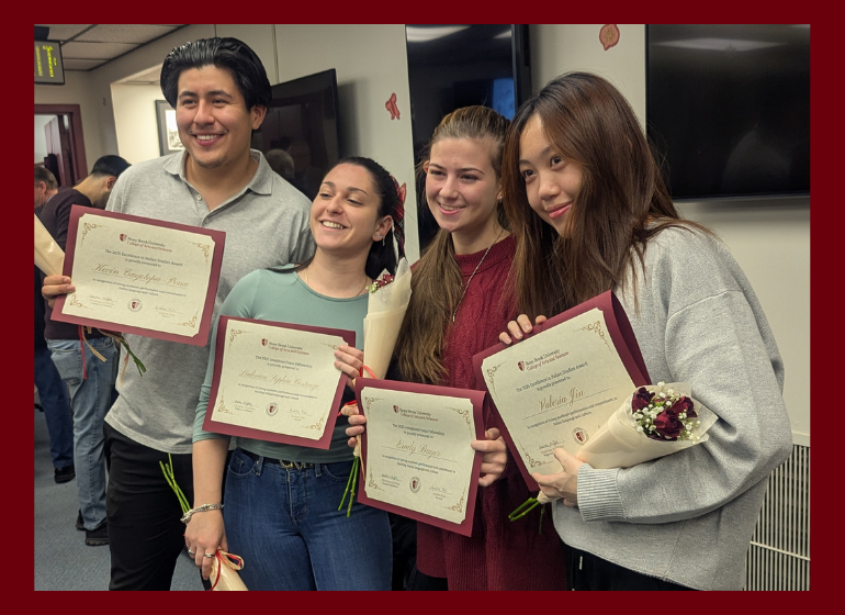 image showcasing From left to right: Scholarship and award recipients Kevin Cayotopa-Pena, Ludovica Sophia Costanzo, Emily Bayer, and Valeria Jin, four SBU Italian language students, who were honored at the Center's Holiday Gathering and Award Ceremony in December 2025