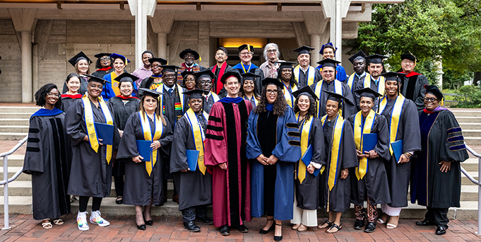 Image of Candler faculty and grads