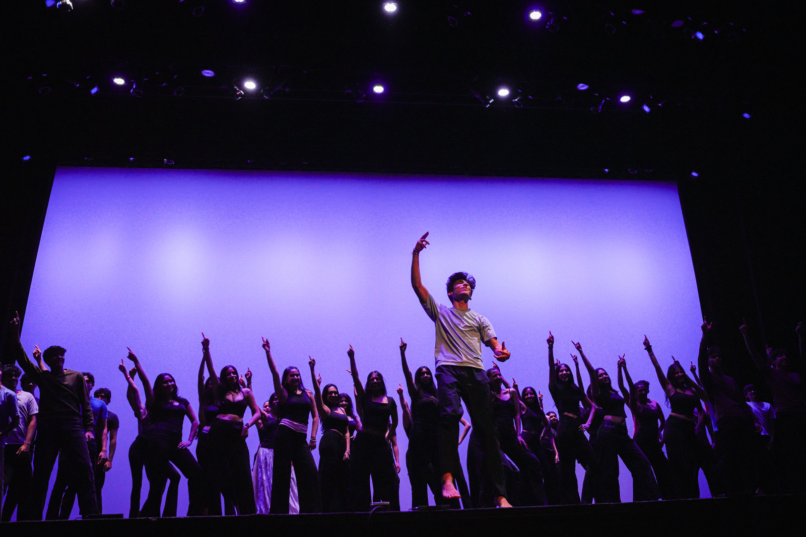 Image of SASA members dancing onstage