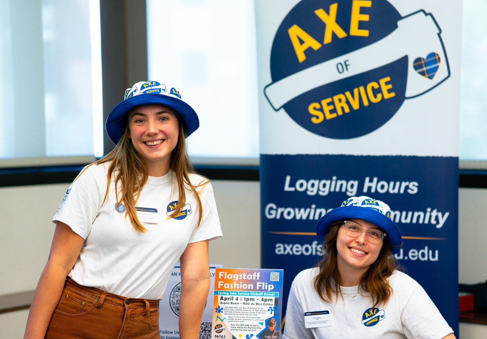 Two NAU Students pose at an Axe of Service event.