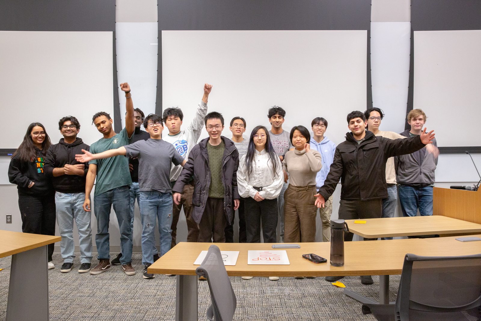 Students cheer following the annual Tri-Co Hackathon. Students cheer following the annual Tri-Co Hackathon.